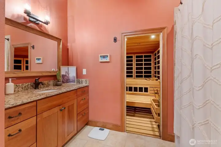 Full bathroom for the suite downstairs, complete with a sauna
