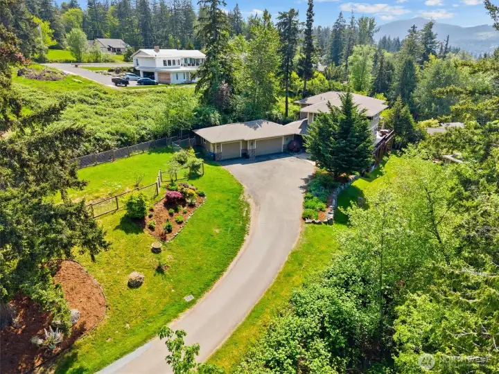 Privately set at the back of the almost one acre property