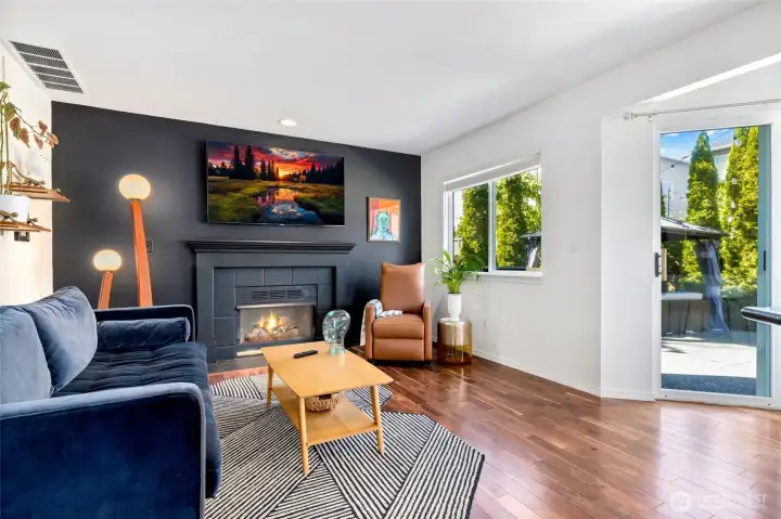 The family room off of the kitchen is cozy and bright.
