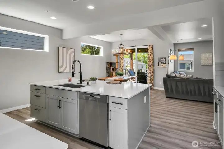 The kitchen is open to the living and dining rooms, making entertaining a breeze!