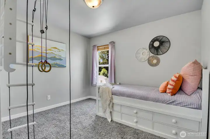 One of 3 spacious secondary bedrooms on the upper floor.