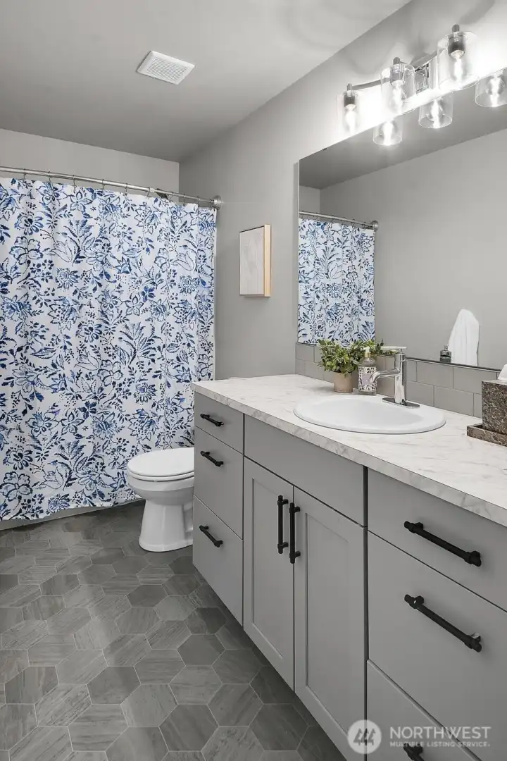 Full bath serves the secondary bedrooms.