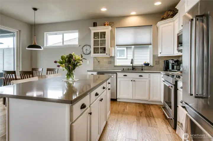 Light & bright scheme w/ glass-front cabinet