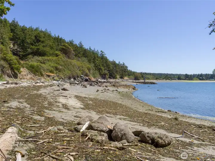 Larger beach, county dock and boat launch in background