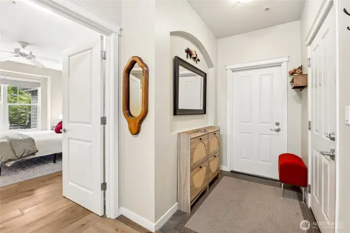 Entrance door on the right, door to Garage and main bedroom w/full bath and walk-in closet Entrance door on the right, door to Garage and main bedroom w/full bath and walk-in closet