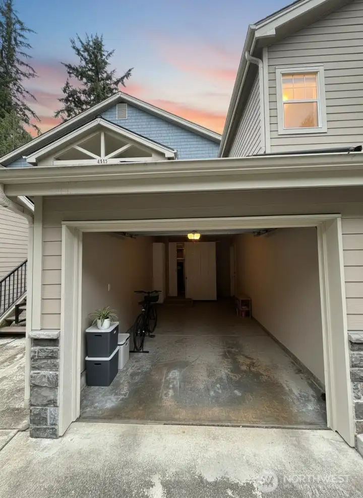 (1) One car garage and driveway (1) One car garage and driveway