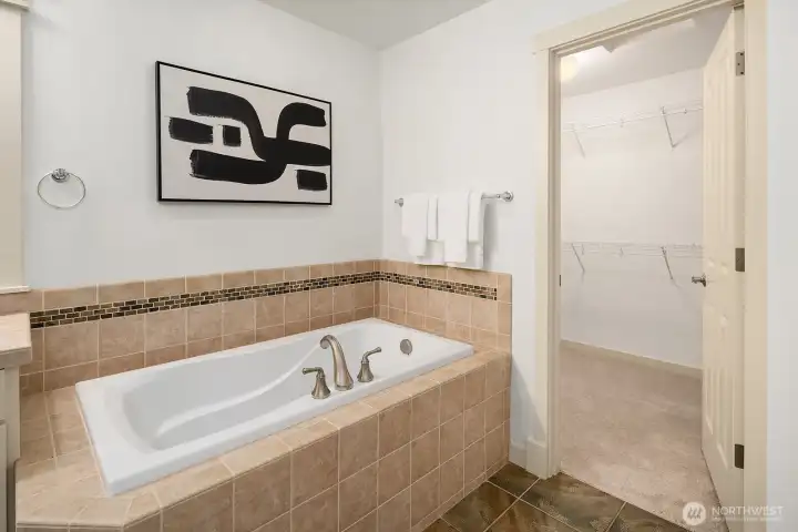 Master bathroom + walk-in closet