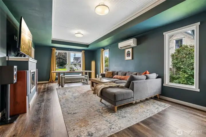 Light filled living room. Has a mini-split with heating and cooling. Light filled living room. Has a mini-split with heating and cooling.