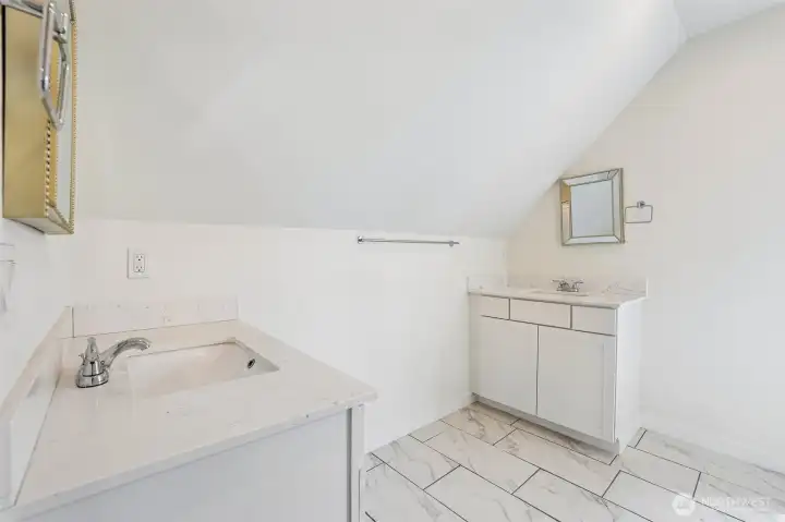 Second floor bathroom with dual sinks. Second floor bathroom with dual sinks.