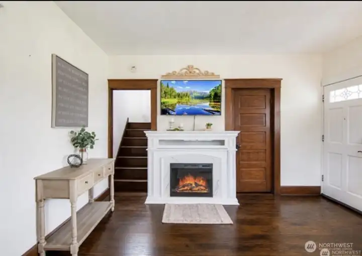 Warm living space with historic character and thoughtful updates
