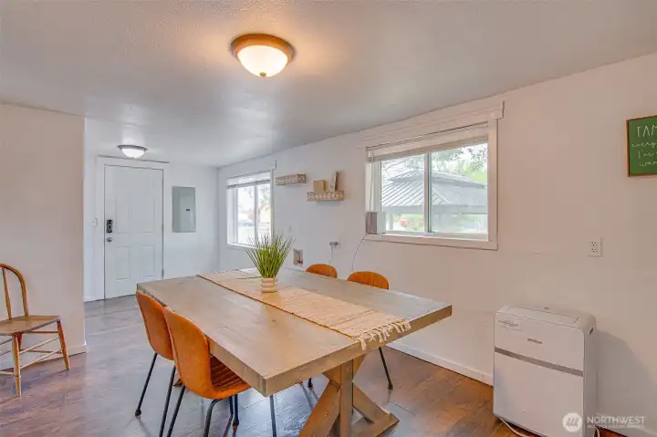 Dining room has outdoor side entrance.