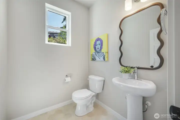 Convenient half bath for guests on main floor