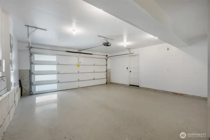 Oversized 2-car garage with epoxy-coated floors