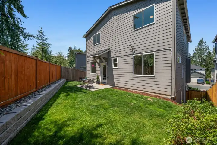 Backs to HOA-owned green space