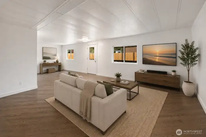 With generous proportions and seamless flow, this inviting gathering space easily accommodates everyday living and special occasions.