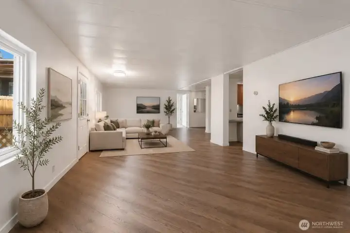 The spacious open-concept living area is beautifully suited for entertaining, relaxing, and making yourself at home.
