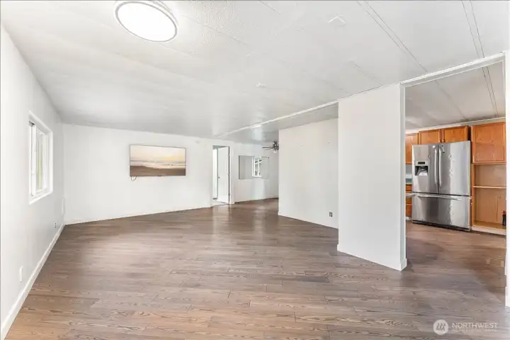 The expansive living area offers an open, airy setting with plenty of room to gather, relax, and entertain.