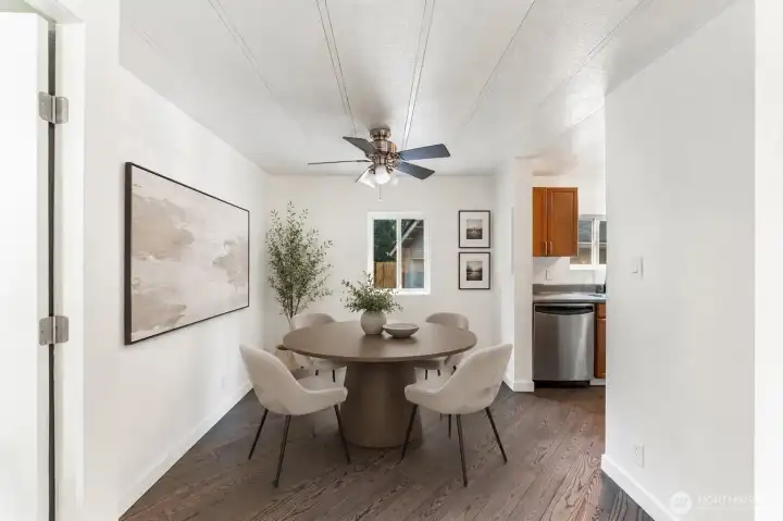The dining area provides a warm gathering place where meals and conversations naturally come together.