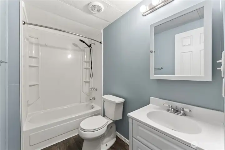 The updated hall bath offers a fresh, bright space with a full tub and shower combination for everyday convenience.