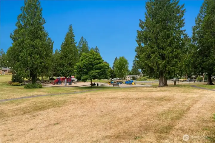 A neighborhood park just moments away offers open green space, walking paths, and a playground to enjoy year-round.