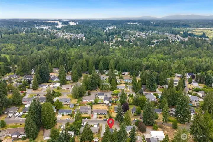 This aerial perspective highlights the generous lot size and the home's ideal position within the neighborhood.