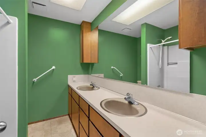 Double sinks with shower/bathtub combo. Double sinks with shower/bathtub combo.