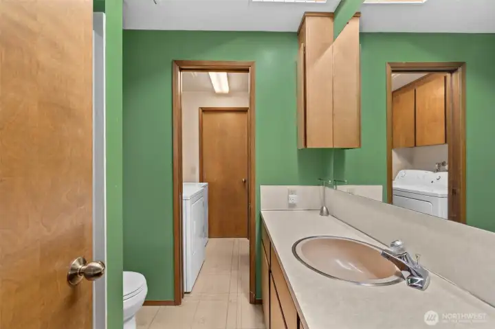 Main Bathroom opens to Laundry Room. Main Bathroom opens to Laundry Room.