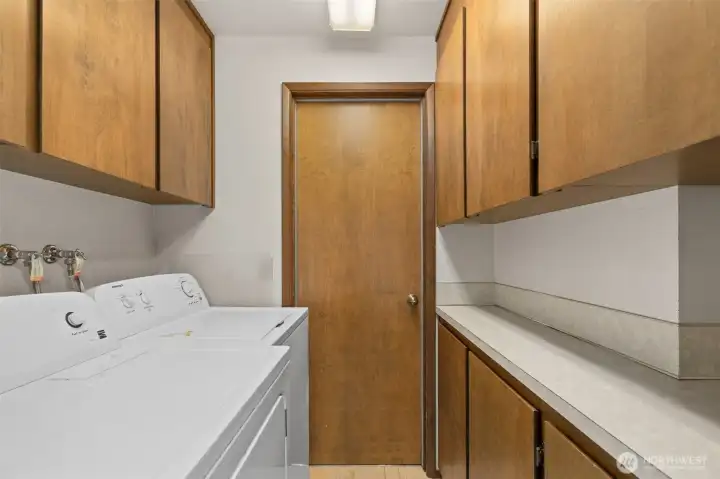 Laundry Room with cabinetry for storage. Laundry Room with cabinetry for storage.