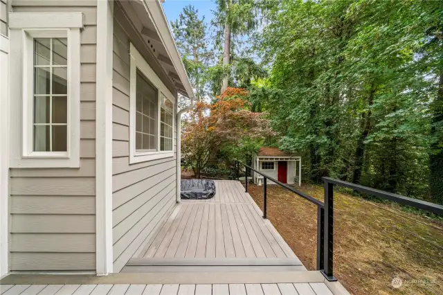 Looking toward the hot tub, fully operational.  Also shown here is the cute storage shed for lawn items.