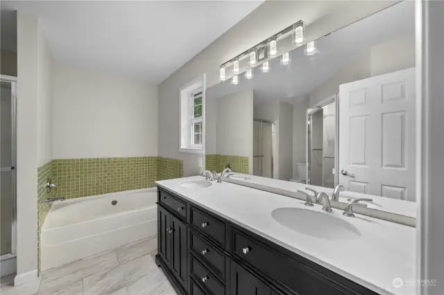 Beautiful 5-piece primary bath with a walk-in closet.