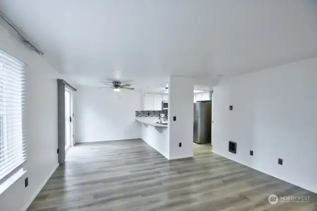 Plenty of room for a large kitchen table plus barstool seating at the kitchen counter