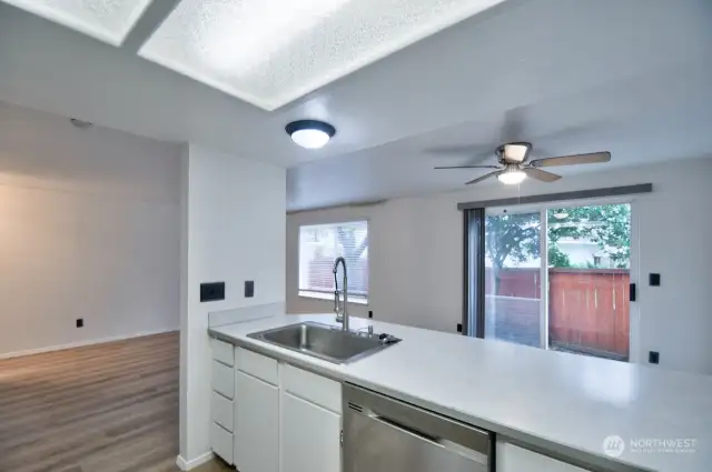 View from kitchen into living and dining area