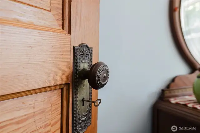 Beautiful original doors with knobs.
