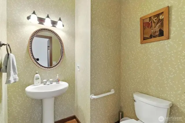 Powder room off the front entry hallway.