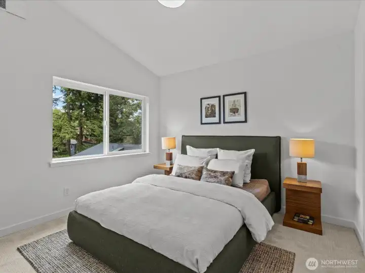 2nd upper bedroom with vaulted ceiling