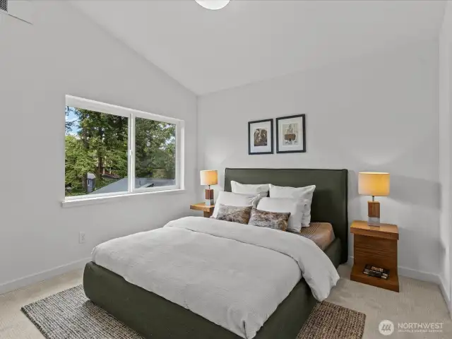 2nd upper bedroom with vaulted ceiling