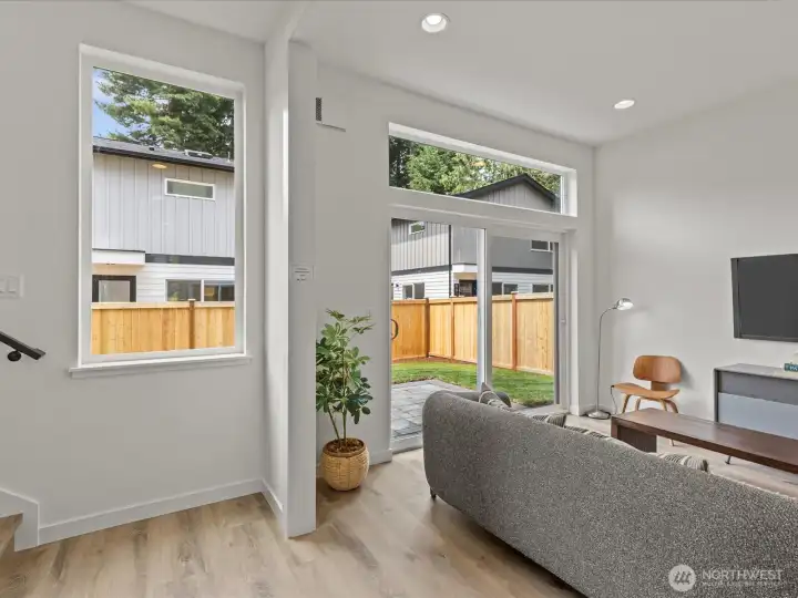 Lower level rec room/bedroom with soaring ceilings!