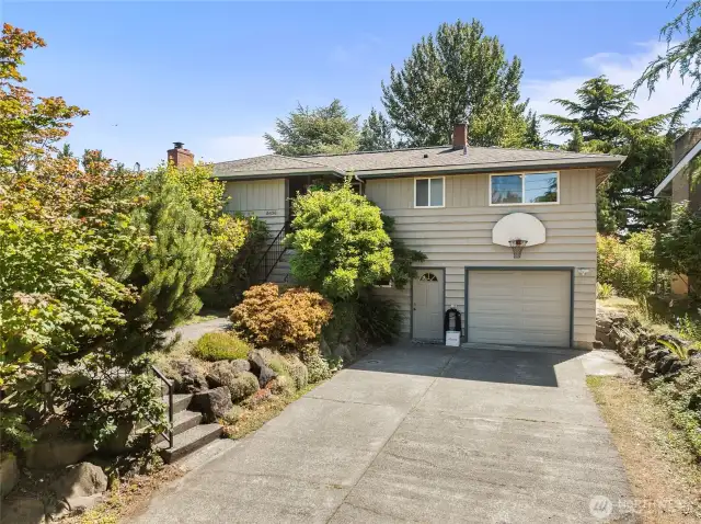 Welcome Home to this spacious and well-cared for home with lots of room and privacy. Plenty of parking too and a basketball hoop for neighborhood pickup games.