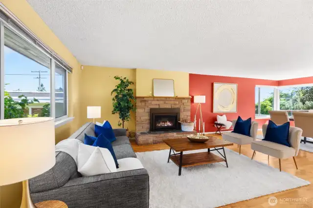 Step right into a light-filled living room that flows to the dining and kitchen areas.