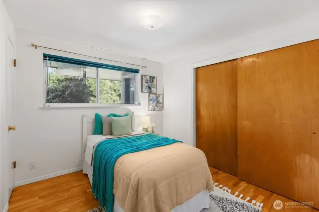 First bedroom upstairs with two closets.