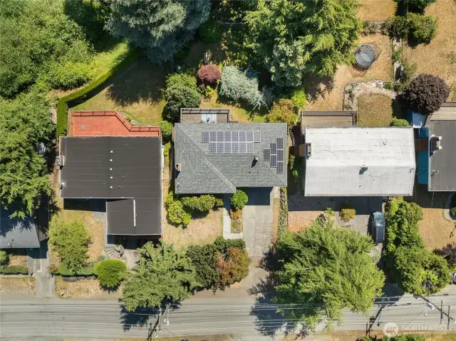 Birds eye view of the house with the solar panels that feed electricity back into the house power.