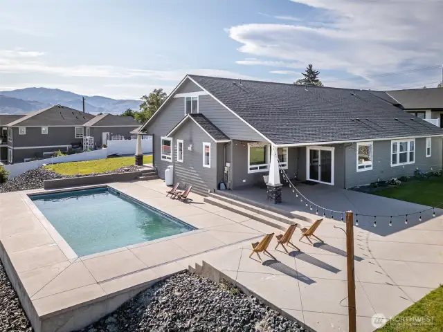 New in-ground pool and upgraded mechanical secure cover and expanded concrete pool surround space