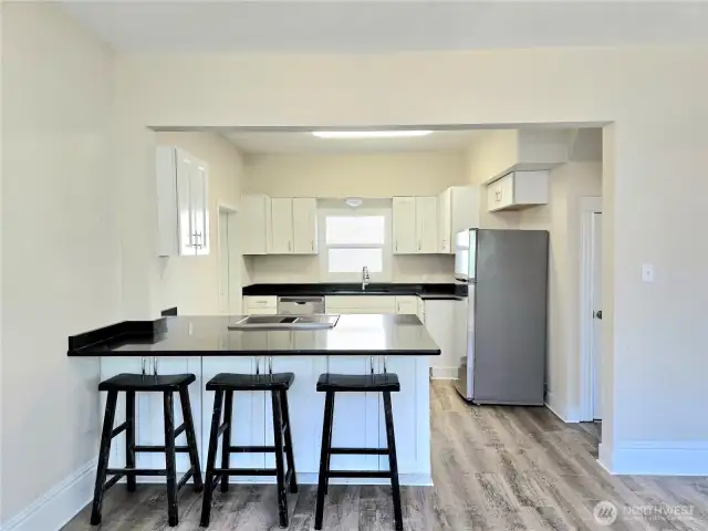 Kitchen w/eating space and SS Appliances.