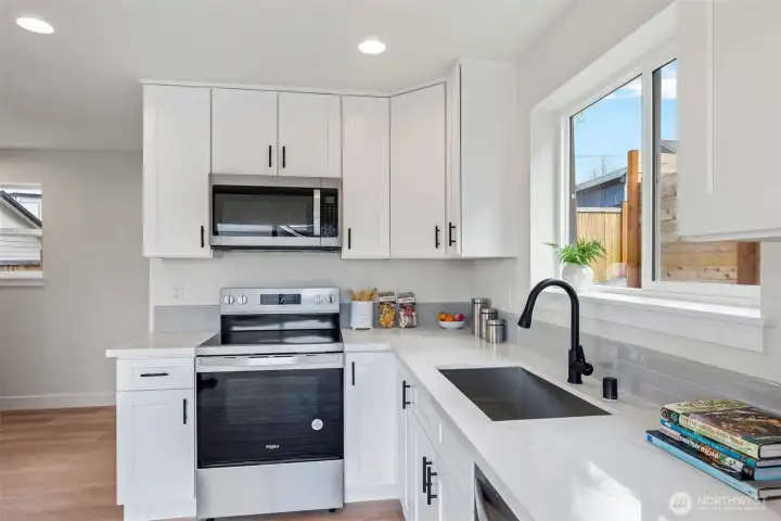 Spacious Kitchen has granite counters.
