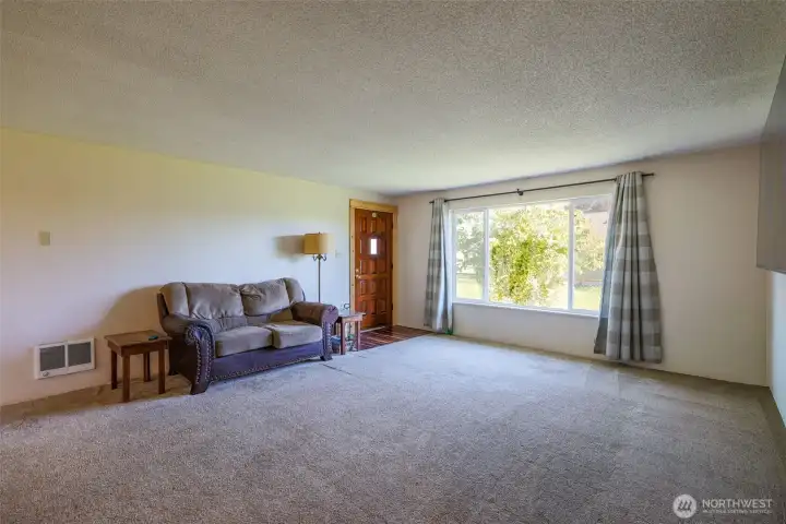 Living room facing entry.