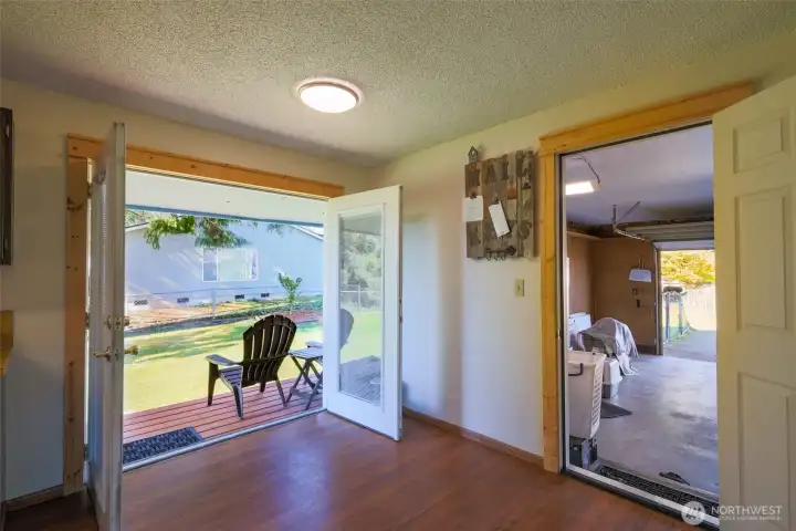 French doors in kitchen opening onto west deck.