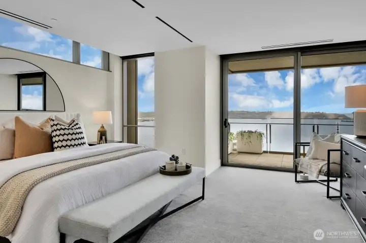 Primary bedroom opens to large view deck in Unit 1206