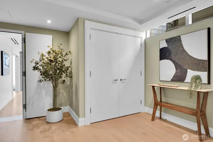 Entry foyer in Unit 1206 with pass-through door to Unit 1205