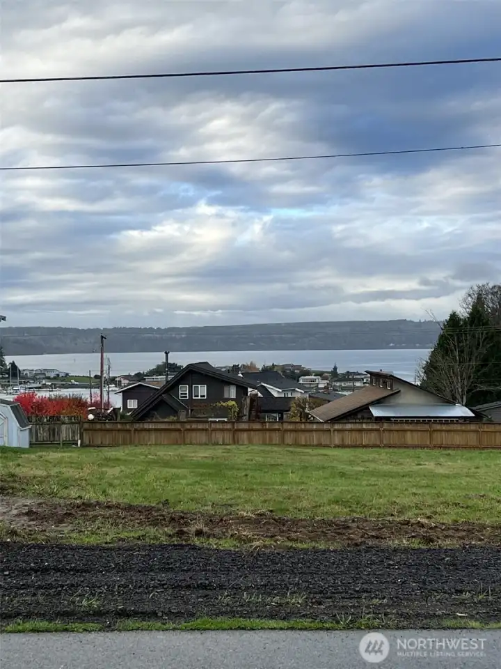 View from lot looking across Buck Road to the west.  Hood Canal and Olympic Mountain views - plus lovely sunsets!