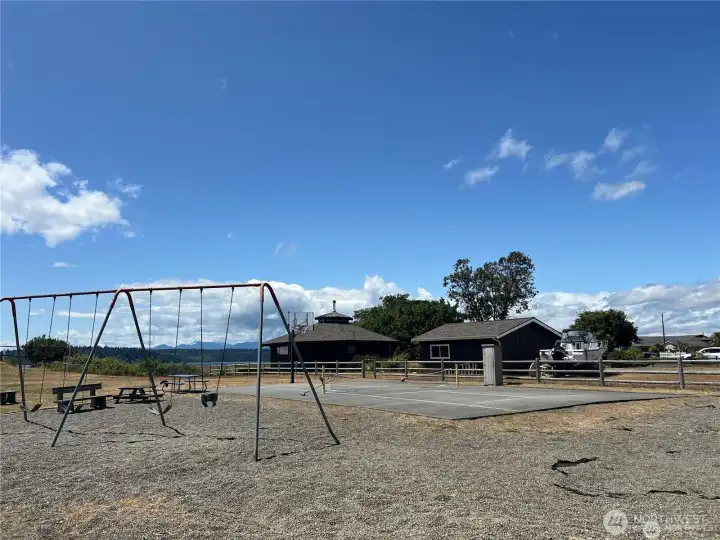 Driftwood Key community fun playground with pickleball court.